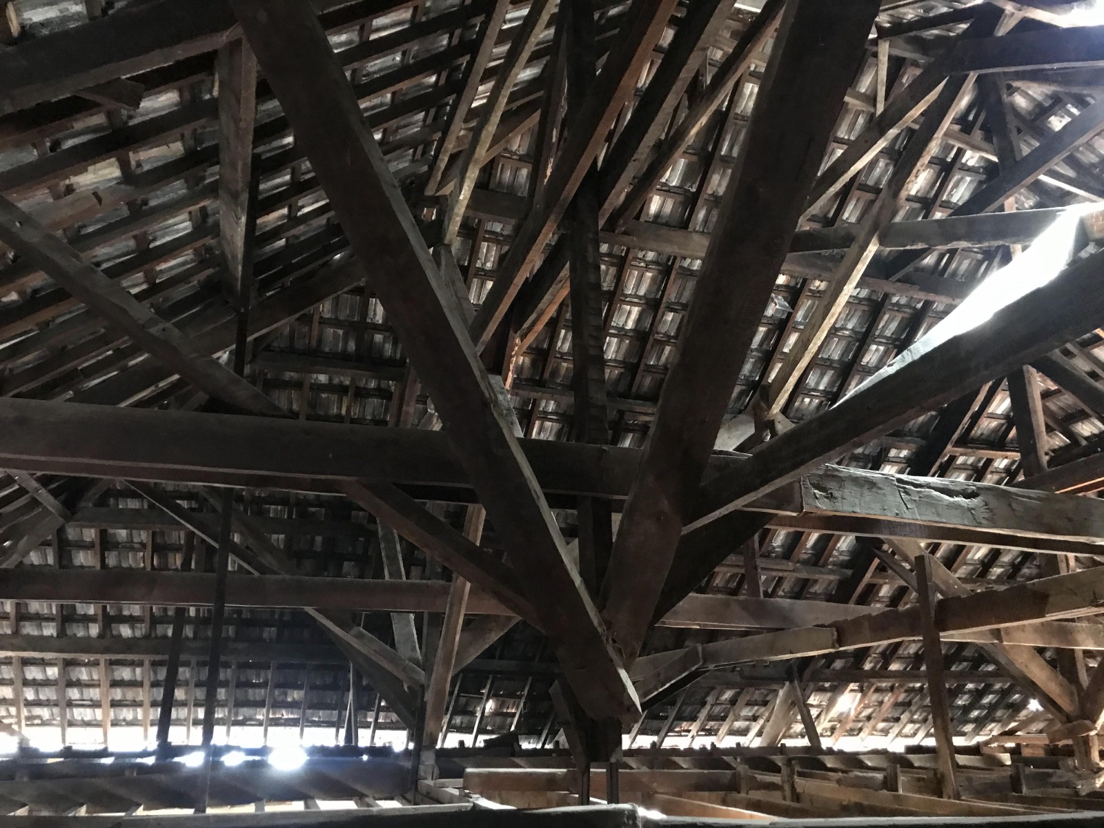 Heritage timber roof structure with original trusses and rafters, surveyed before restoration by GEM Corporate